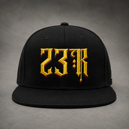 Black 23Ravens snapback cap with gold gothic embroidery front view